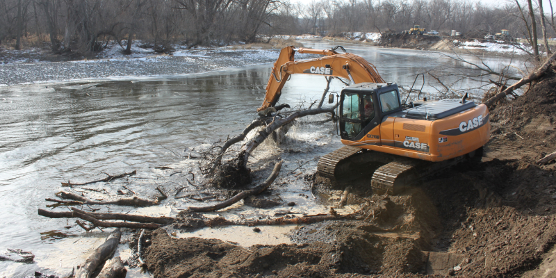 excavator in the river dredging