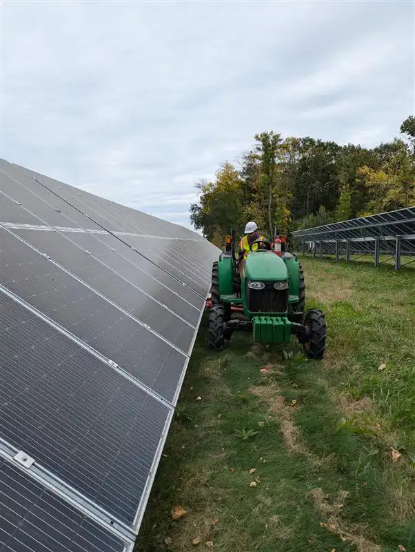 Mowing along side a solar panel